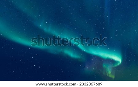 Northern lights or Aurora borealis in the sky - Tromso, Norway Royalty-Free Stock Photo #2332067689