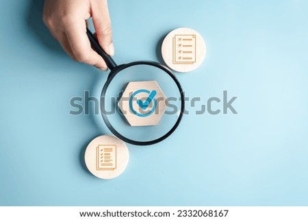 Document Management Checking System, online documentation database and process manage files, Magnifier check and focus to document folder, documentation. Corporate business technology concept. Royalty-Free Stock Photo #2332068167