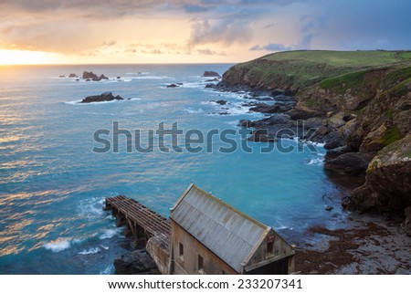 Dramtic sunset over Polpeor Cove at Lizard Point Cornwall England UK Europe