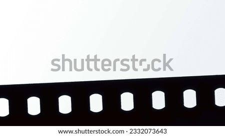 Cinema film strip isolated on white background with copy space.