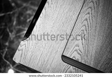 Empty rough wooden table top in dark room