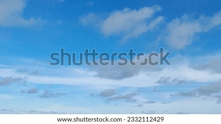 he bright sky with strands of beautiful white clouds in Indonesia