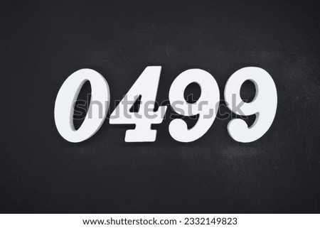 Black for the background. The number 0499 is made of white painted wood.