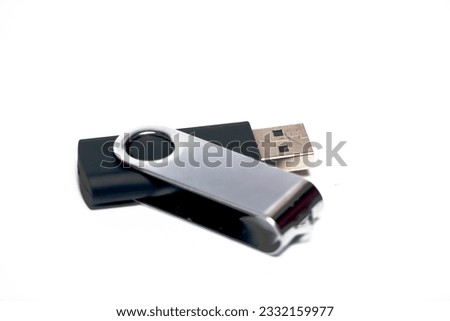 black and gray flash disk on a white background