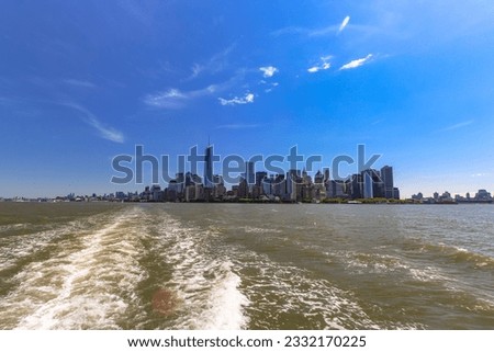 Scenic waterfront skyline with One World Trade Center seen from Upper New York Bay, Manhattan, New York City, USA