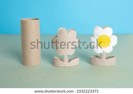 toilet paper roll craft concept for kid and kindergarten, DIY, tutorial, summer or spring flower toy, recycle art Royalty-Free Stock Photo #2332223371