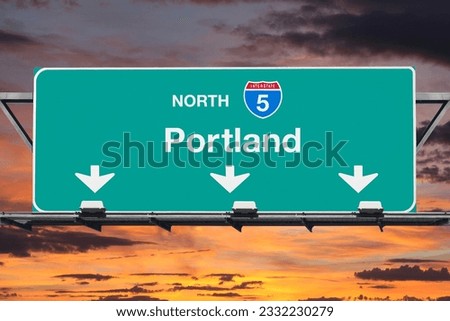 Portland Oregon route 5 north overhead freeway sign with sunset sky. Royalty-Free Stock Photo #2332230279