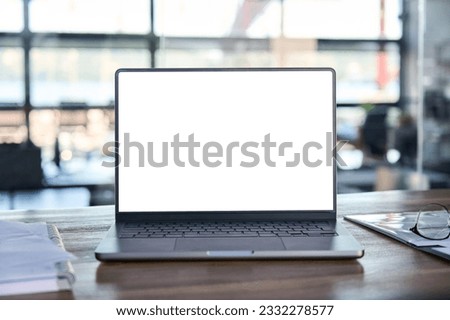 Laptop pc mock up template design on office workplace desk, white mockup empty blank computer screen on office work table business web technology at modern workspace, closeup. Royalty-Free Stock Photo #2332278577