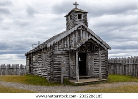 Old Church Log Cabin Exterior at Fuerte Bulnes, Famous Historic Chile Fort on the Strait of Magellan near Punta Arenas, Chilean Patagonia, South America Royalty-Free Stock Photo #2332286185