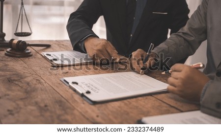 Full concentration at work. correctly sign contracts with clients, Sign and Execute Binding Contracts, contracts jargon, legal terms and definitions, signed by unauthorised person Royalty-Free Stock Photo #2332374489