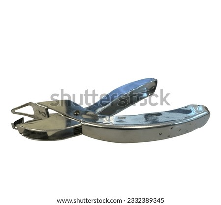 The staple extractor is a device that allows the staples to be quickly removed from the material. Royalty-Free Stock Photo #2332389345