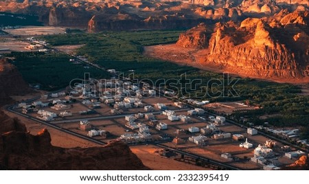 Close up of a town seen from Harrat viewpoint, Al Ula, Saudi Arabia. Royalty-Free Stock Photo #2332395419