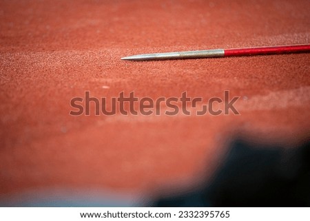 Javelin on track and field stadium Royalty-Free Stock Photo #2332395765