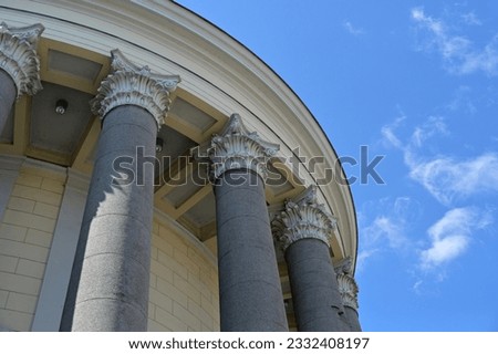 corner fragment of a historical building with round columns