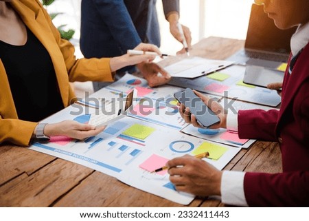 Business team collaboration discussing working analyzing with financial data and marketing growth report graph in team, presentation and digital tablet, laptop

 Royalty-Free Stock Photo #2332411443