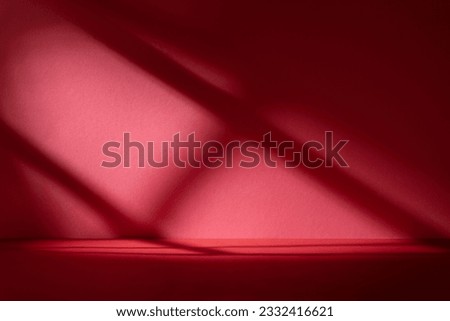 Abstract red studio background for product presentation. Backdrop with shadows of window for display product. Royalty-Free Stock Photo #2332416621