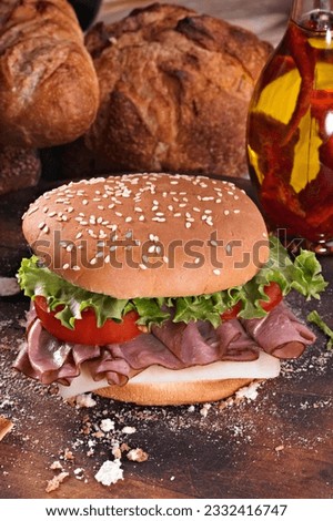  Satisfying Indulgence: Close-Up of a Juicy Hamburger, Tempting the Taste Buds in 4K Resolution