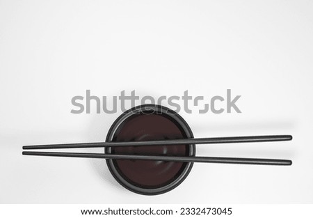 Flat lay chopsticks and soy sauce on white background. Traditional japanese food.,3d model and illustration.