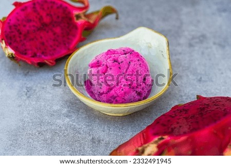 Dragon fruit organic vegetarian ice cream or sorbet with fruits side view