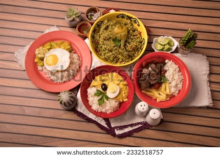 Assorted plates dishes aji de gallina arroz con pollo lomo saltado Peru peruvian traditional buffet table gourmet food Royalty-Free Stock Photo #2332518757