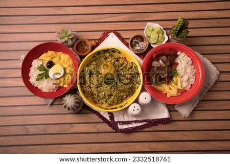 Assorted plates dishes aji de gallina arroz con pollo lomo saltado Peru peruvian traditional buffet table gourmet food Royalty-Free Stock Photo #2332518761