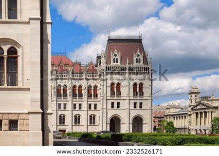 Hungarian Parliament Building in neo-Gothic style. Parliament of Budapest is situated on Kossuth Square in the Pest side of the city, on the eastern bank of the Danube. Budapest, Hungary.   Royalty-Free Stock Photo #2332526171