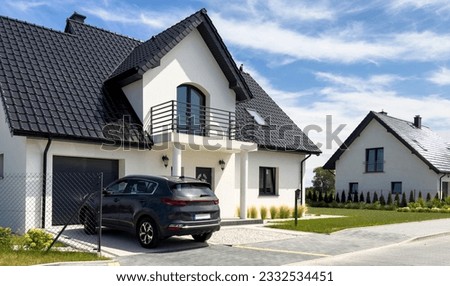 Exterior of a modern elegant single family house in Poland Royalty-Free Stock Photo #2332534451