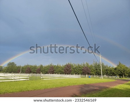 Double rainbows over the horse farm picture perfect