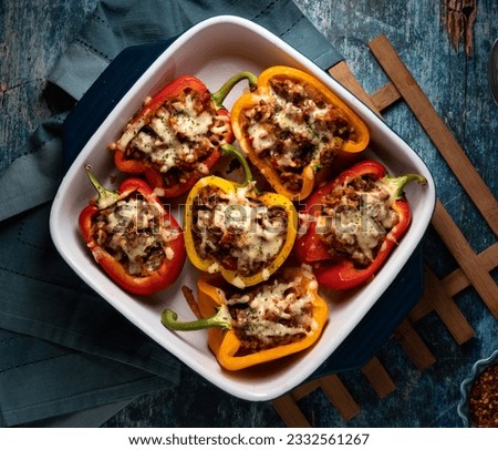 Above view of stuffed bell peppers, ready for serving. Royalty-Free Stock Photo #2332561267