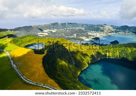 Aerial shot, drone point of view, Boca do Inferno. Picturesque lakes in volcanoes craters. San Miguel, Ponta Delgada island, Azores, Portugal. Bird eye view. Landmarks and natural wonders concept 