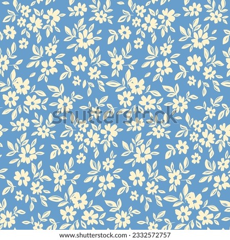 Seamless floral pattern, liberty ditsy print with pretty sketch botany. Artistic botanical design: small hand drawn white flowers, tiny leaves on a blue background. Vector illustration in two colors. Royalty-Free Stock Photo #2332572757