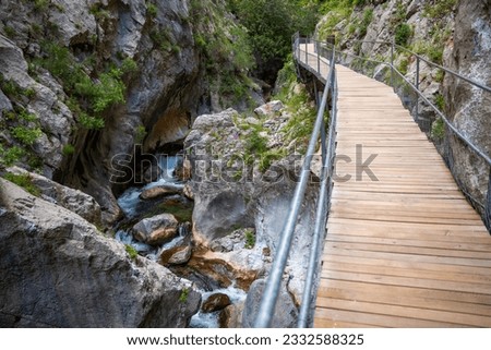 Sapadere canyon with wooden paths and cascades of waterfalls in the Taurus mountains near Alanya, Turkey. High quality photo