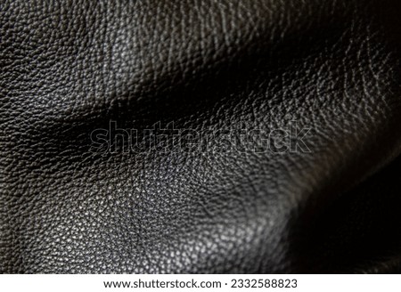 Texture. Rough black genuine leather. Royalty-Free Stock Photo #2332588823