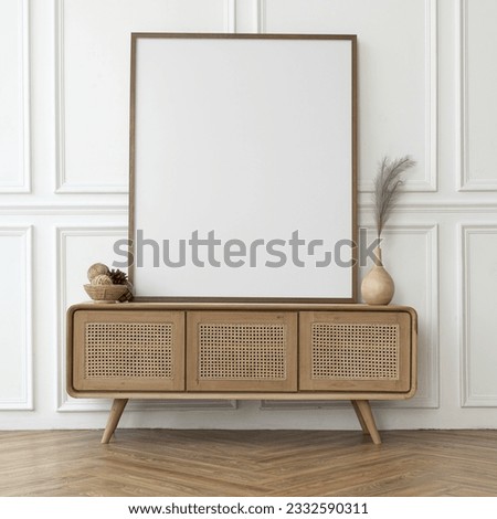 Picture frame mockup JPG on a rattan cabinet, high quality image Royalty-Free Stock Photo #2332590311