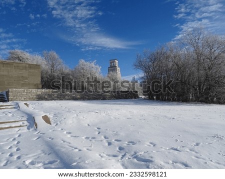 The photo shows the view on a hill in winter.