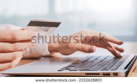 Online payment. Internet banking. Business woman hand typing personal data cvv code on laptop from credit card for cashless money transfer purchase. Royalty-Free Stock Photo #2332628803