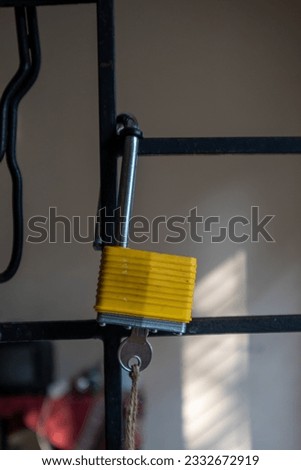 black iron lock and iron door