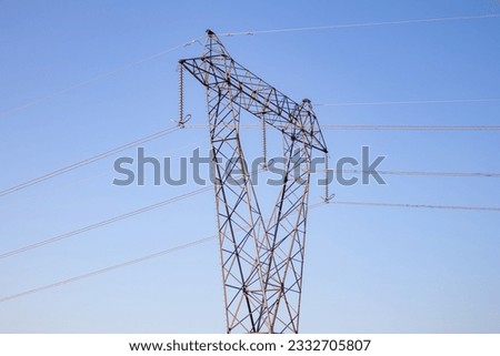Power pole with blue sky Royalty-Free Stock Photo #2332705807