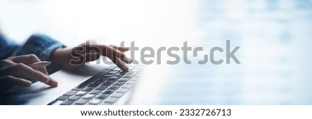 Business woman hands typing on laptop computer keyboard, surfing the internet at the office with copy space for web banner, Woman worker and business concept.