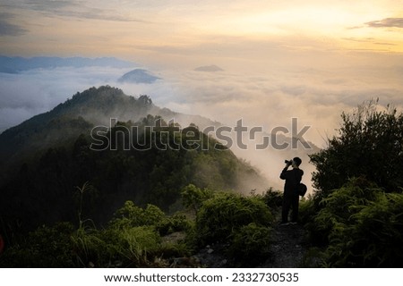 Scenic point Gunungsilipat in morning sunrise with beautiful sky and mist at AiYoeweng sub-district, Betong area, Yala province, Thailand.
