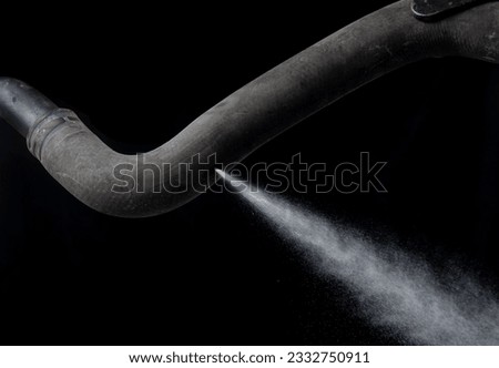 Old rubber hose straps,water or gas leak form rubber tube or hole Royalty-Free Stock Photo #2332750911
