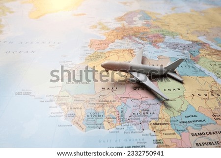 Air travel concept.airplane with touristic map