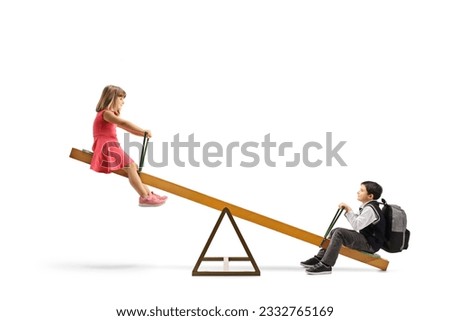 Sister and brother playing on a seesaw isolated on white background Royalty-Free Stock Photo #2332765169