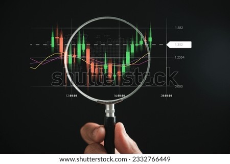 A trader's strategic approach to the stock market, seen through the magnifying glass that enhances the technical graph of the bar chart, signaling profitable investment concepts. Royalty-Free Stock Photo #2332766449