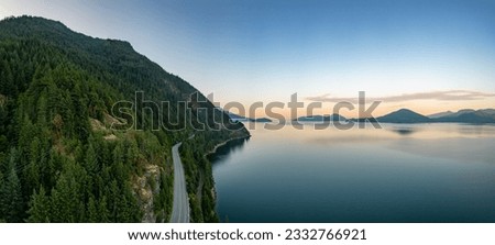 Sea to Sky Highway on Pacific Ocean West Coast. Aerial Panorama. Sunny Colorful Sunrise. Located in Howe Sound between Vancouver and Squamish, British Columbia, Canada. Royalty-Free Stock Photo #2332766921