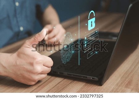Adult man login or sign in with fingerprint scanning technology in the computer laptop. Secure encryption and access to the user's private information to access the internet.