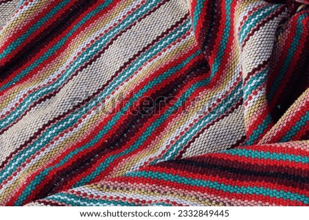 Abstract texture of a colorful blanket patchwork
                                Royalty-Free Stock Photo #2332849445