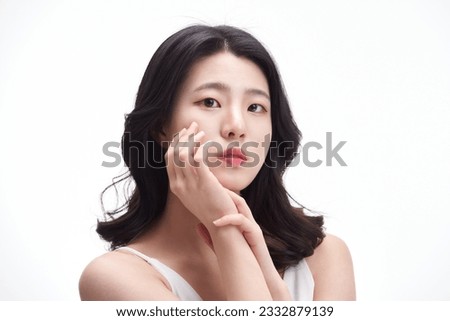 picture of a young girl with clean skin on a white background. Skin care and beauty.