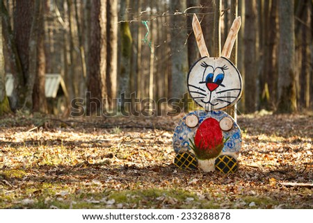 Colorful rabbit figure in the forest