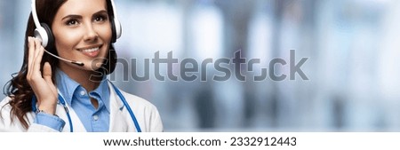 Portrait photo of happy smiling female doctor in headset, over blurred modern office background, copy space area for some text. Medical call center concept picture.